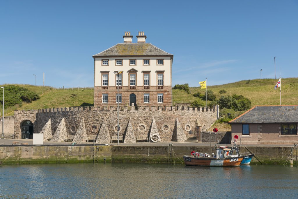 A view of Gunsgreen house from across the harbour.
